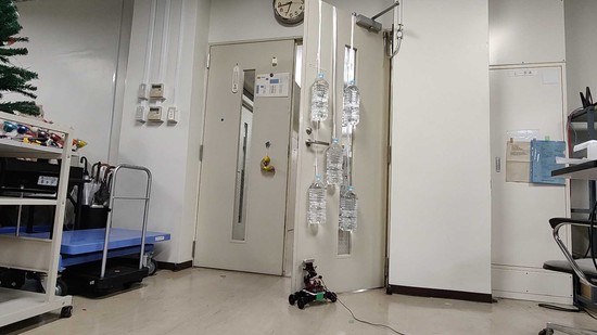 Compact Door Closing Robot